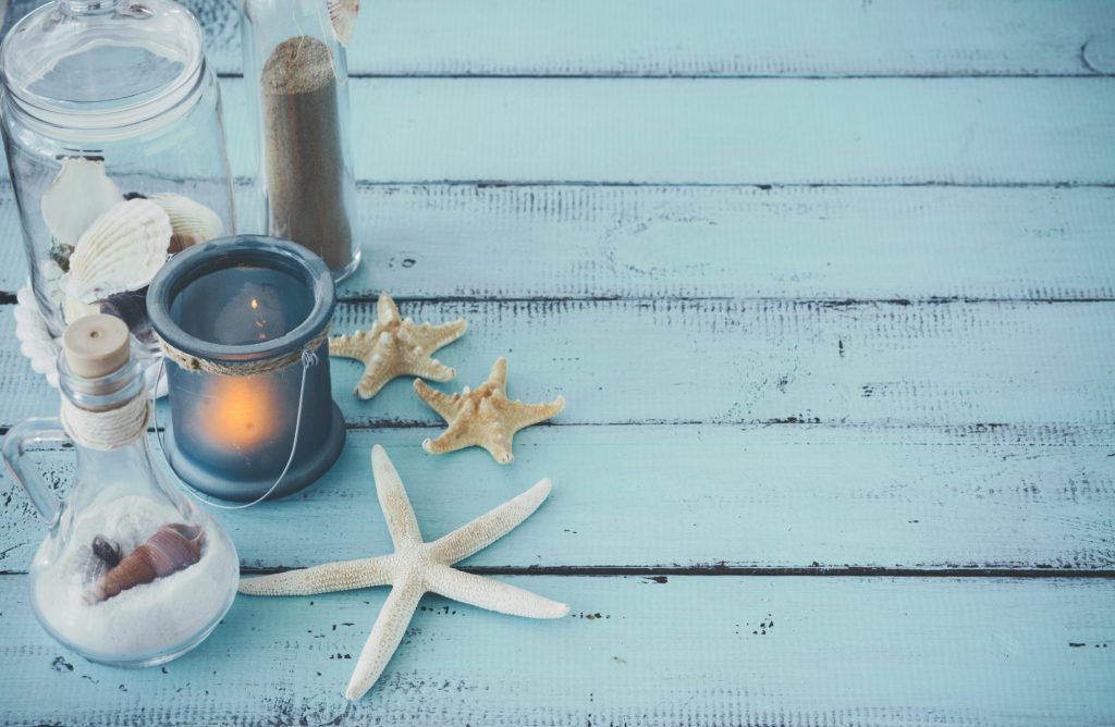 Nautical style props including starfish and shells
